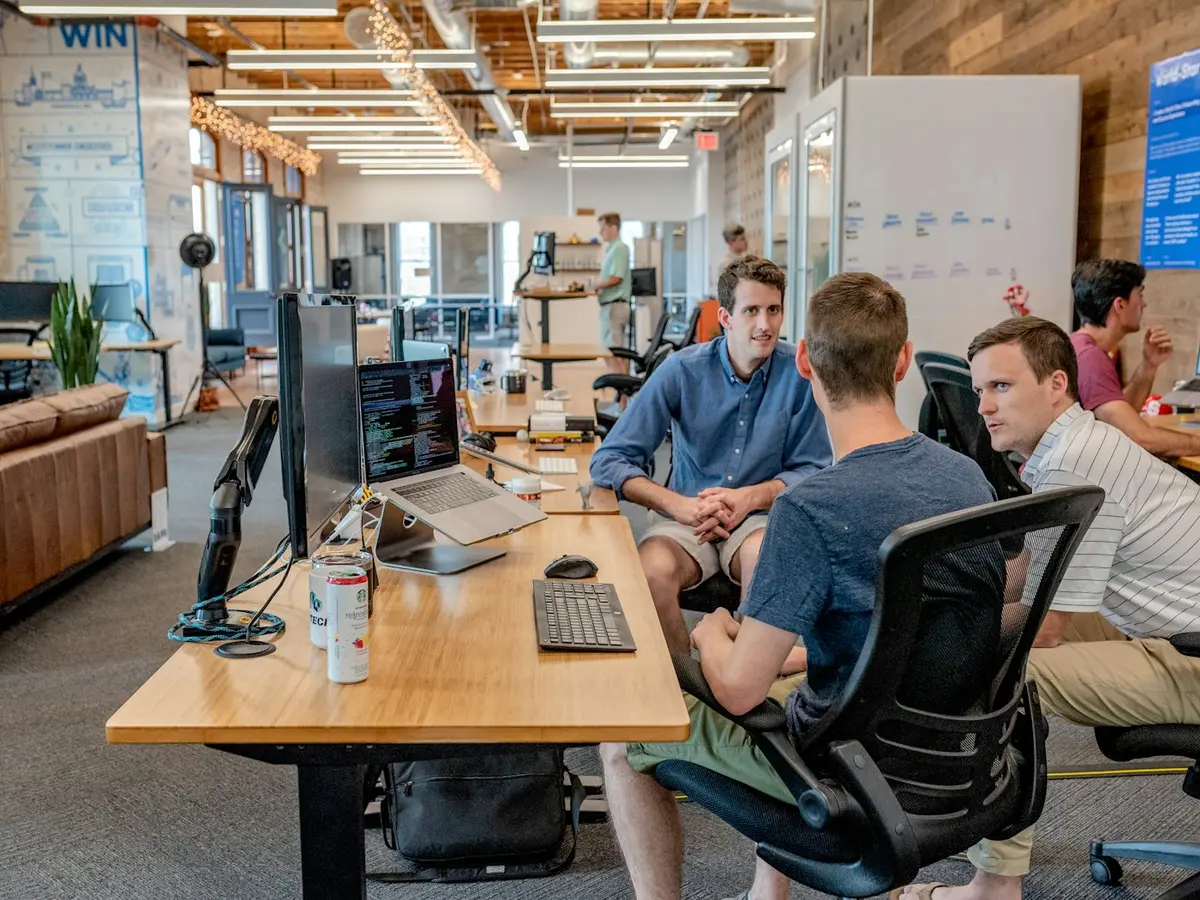 Engineers discussing a project in the office